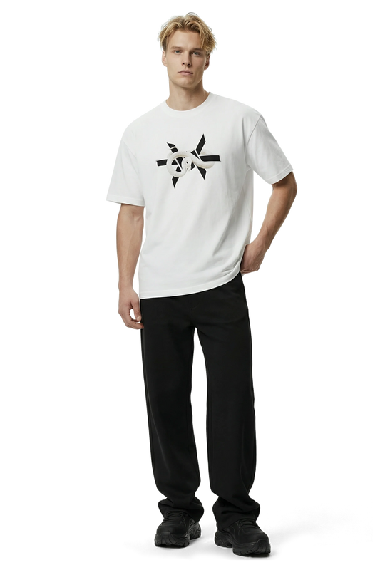 Man wearing a white t-shirt with a black 'Ominous' logo star design and black pants on a white background