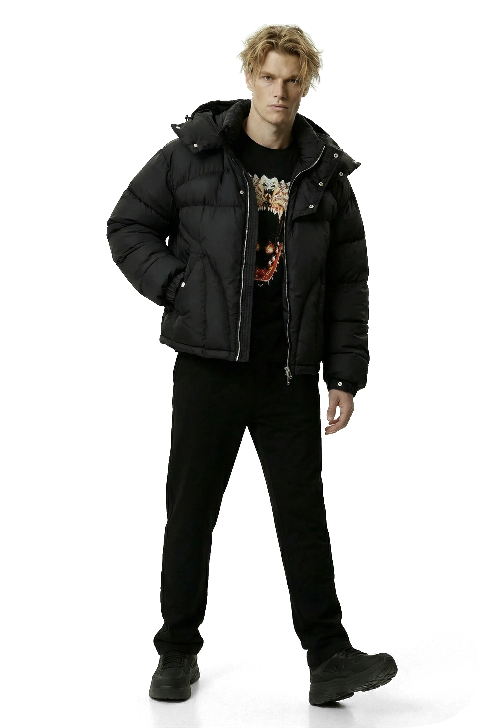 Man wearing a black puffer jacket and black pants on a transparent background