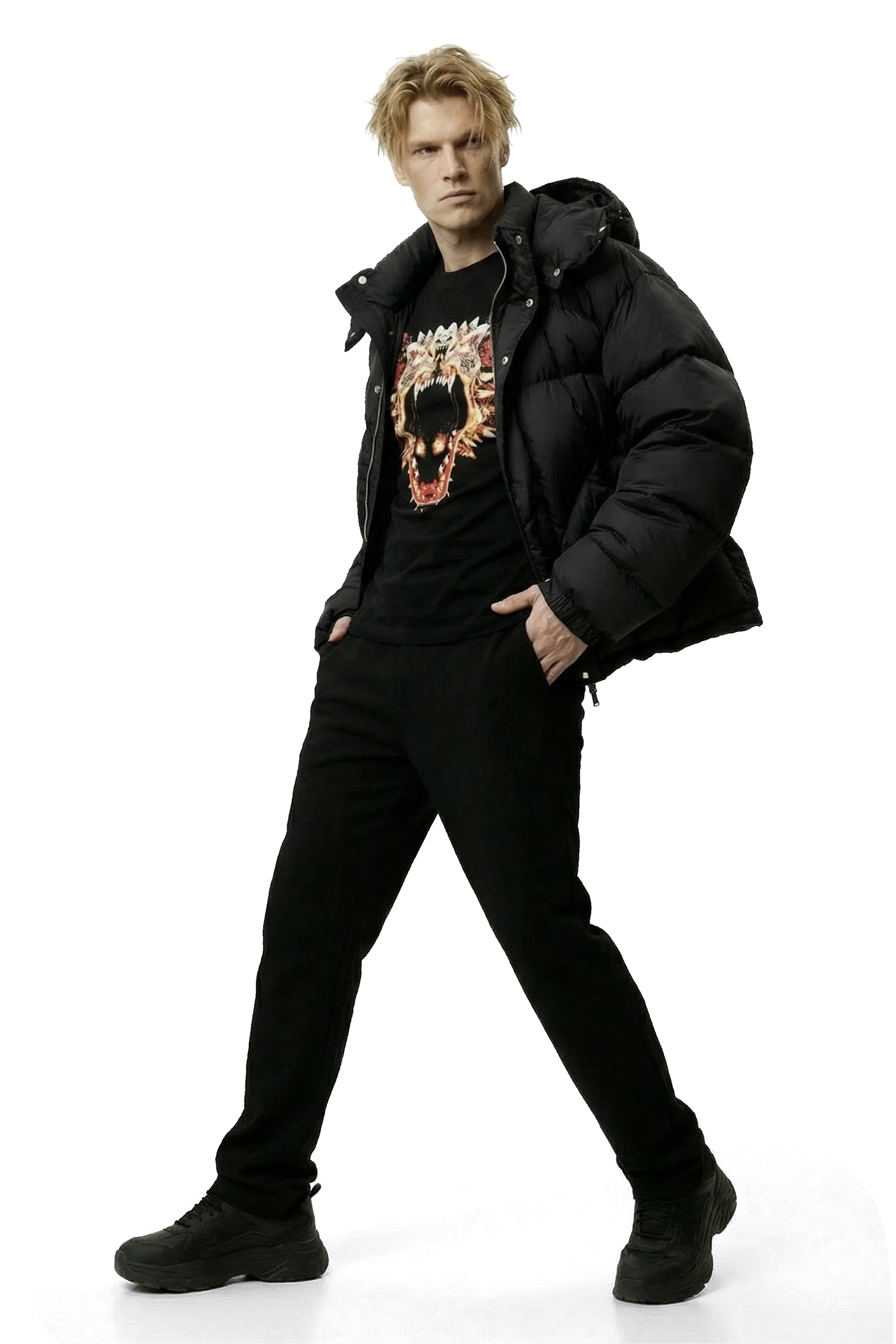Man wearing a black jacket, black pants, and a black shirt with a dragon graphic design on a white background