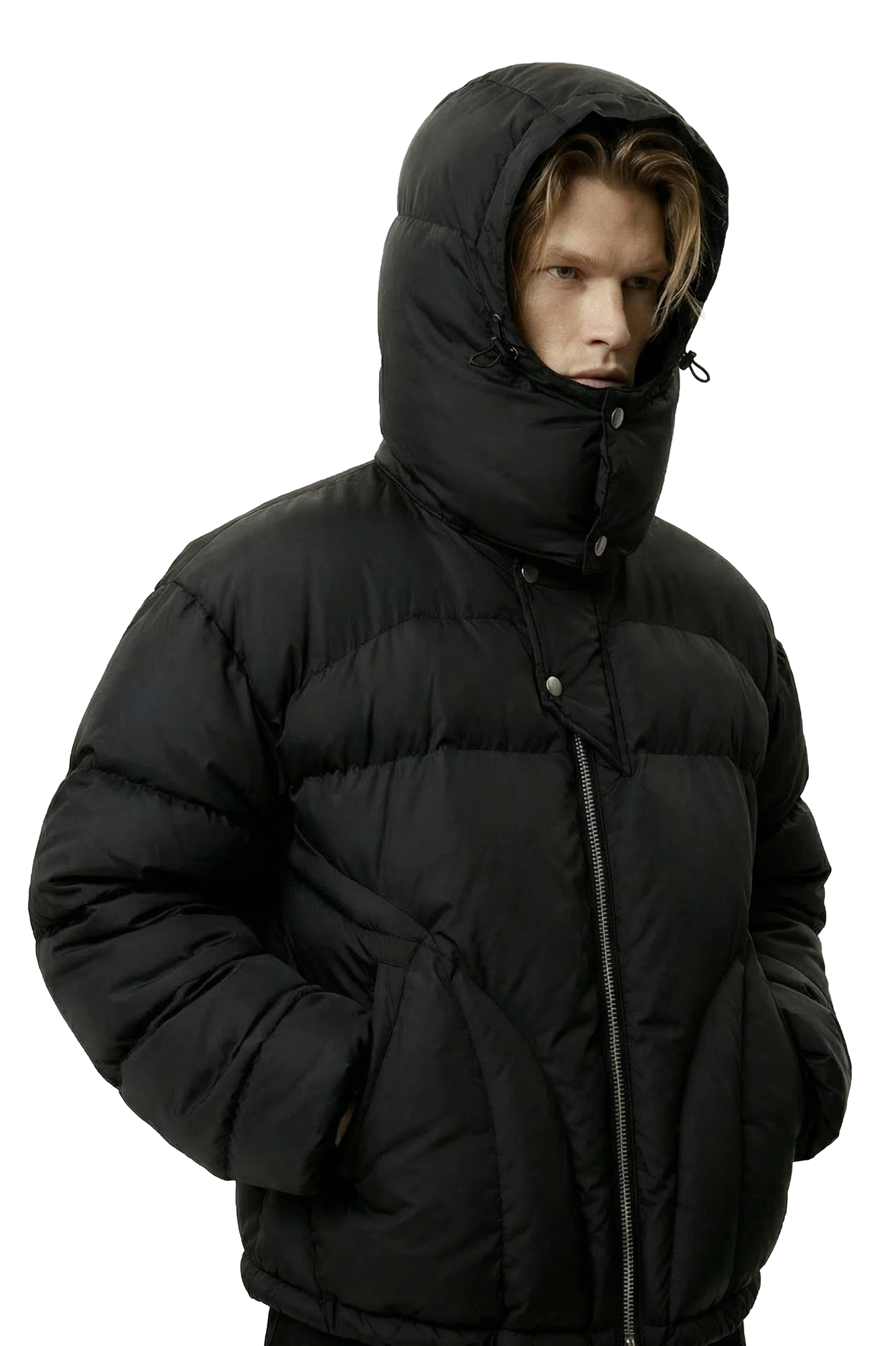 Person wearing a black puffer jacket with a hood on a white background