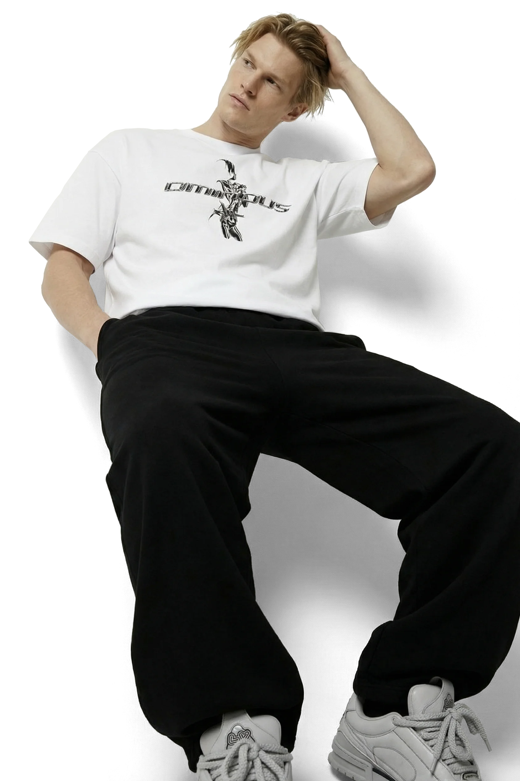 Ominous chrome silver girl heavyweight oversized tee - Person wearing a white t-shirt with text and black pants on a white background