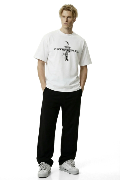 Ominous chrome silver girl heavyweight oversized tee - Man wearing a white t-shirt with a graphic design and black pants on a white background