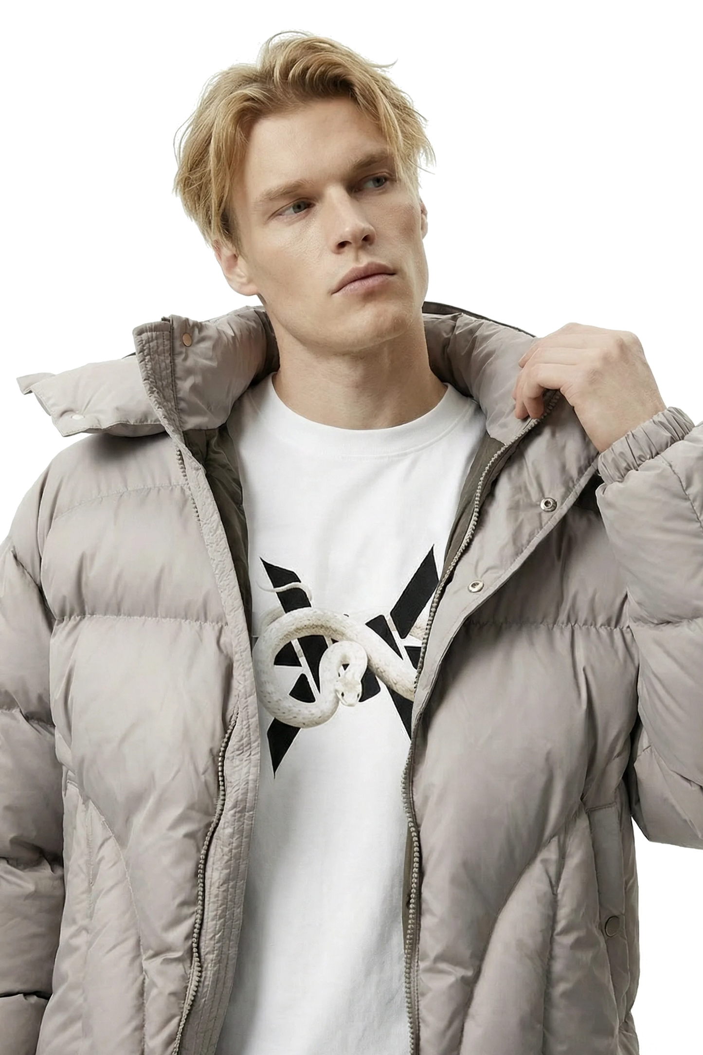 Man wearing a light gray puffer jacket over a white t-shirt with a black 'Ominous' logo on a white background