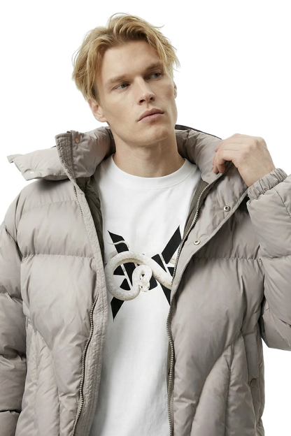 Man wearing a light gray puffer jacket over a white t-shirt with a black 'Ominous' logo on a white background