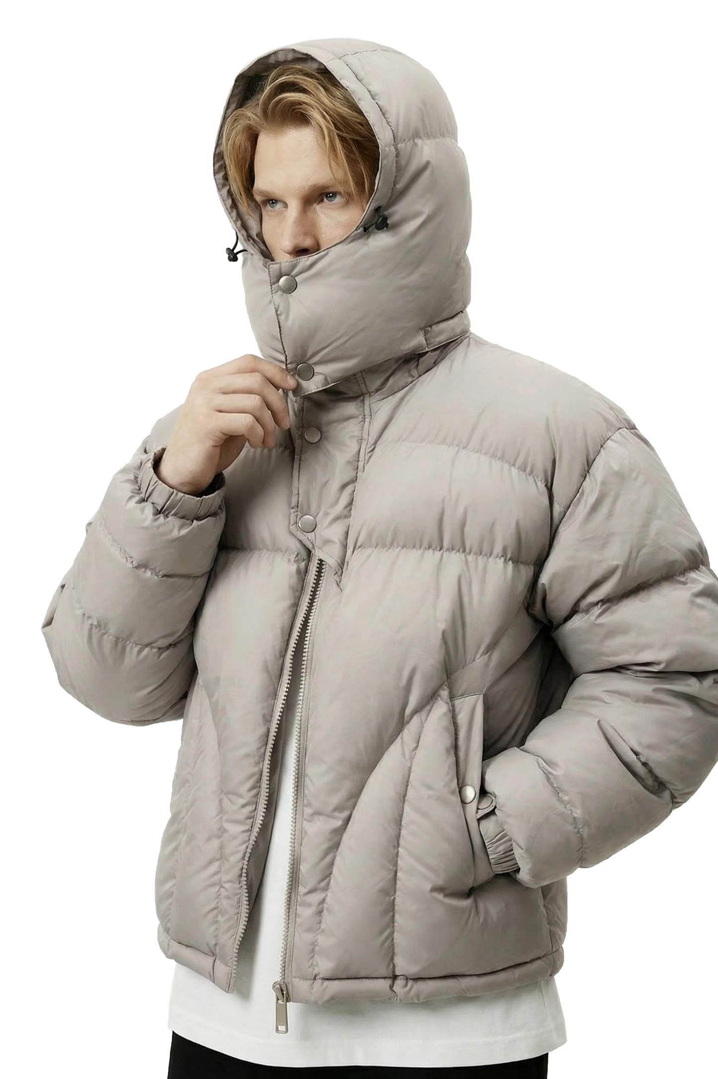 Person wearing a gray puffer jacket with a hood on a white background