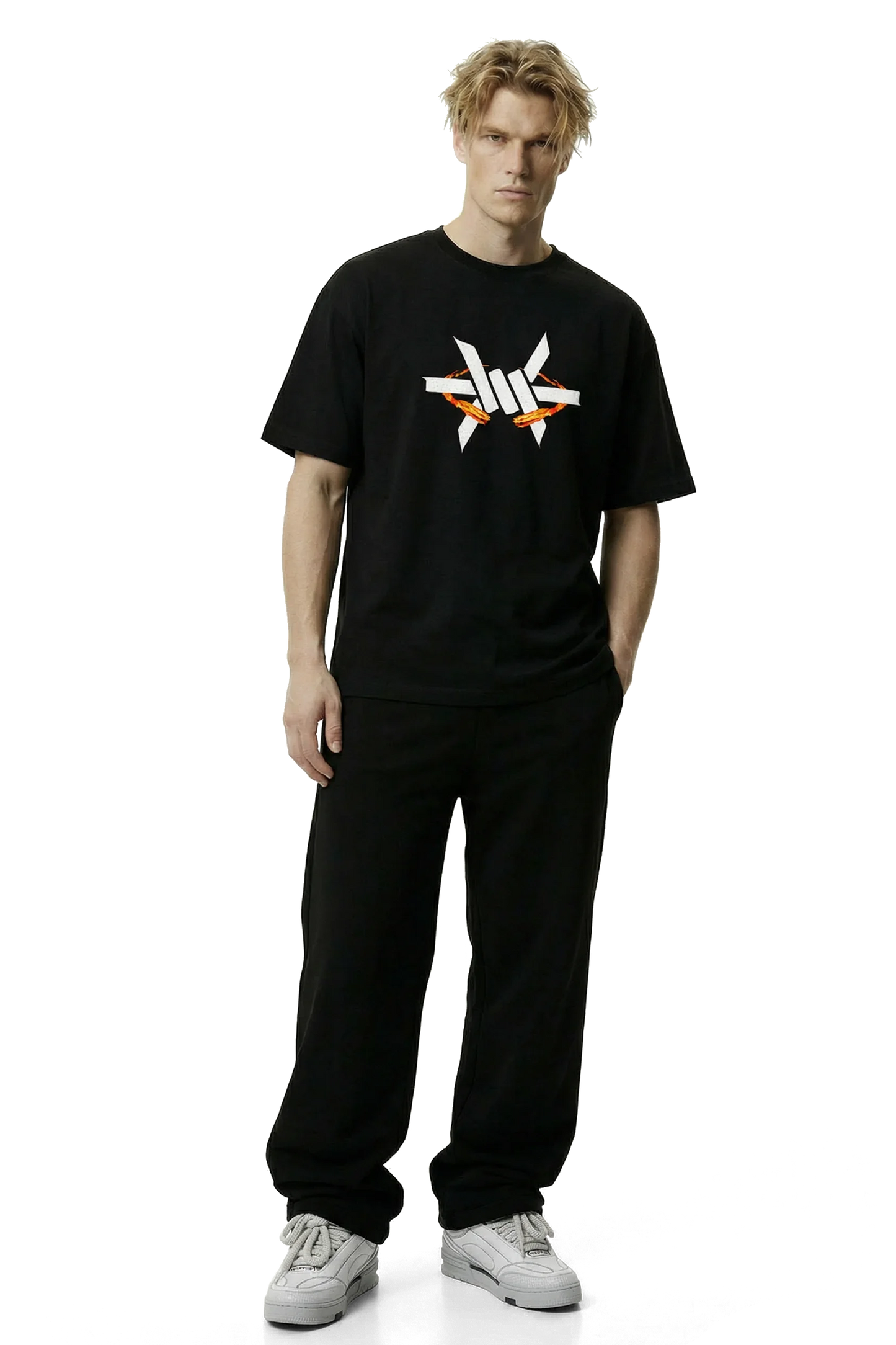 Ominous Fireball Heavyweight Oversized Tee - Person wearing a black t-shirt with a logo on a white background