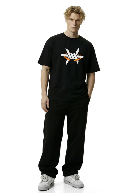 Ominous Fireball Heavyweight Oversized Tee - Person wearing a black t-shirt with a logo on a white background