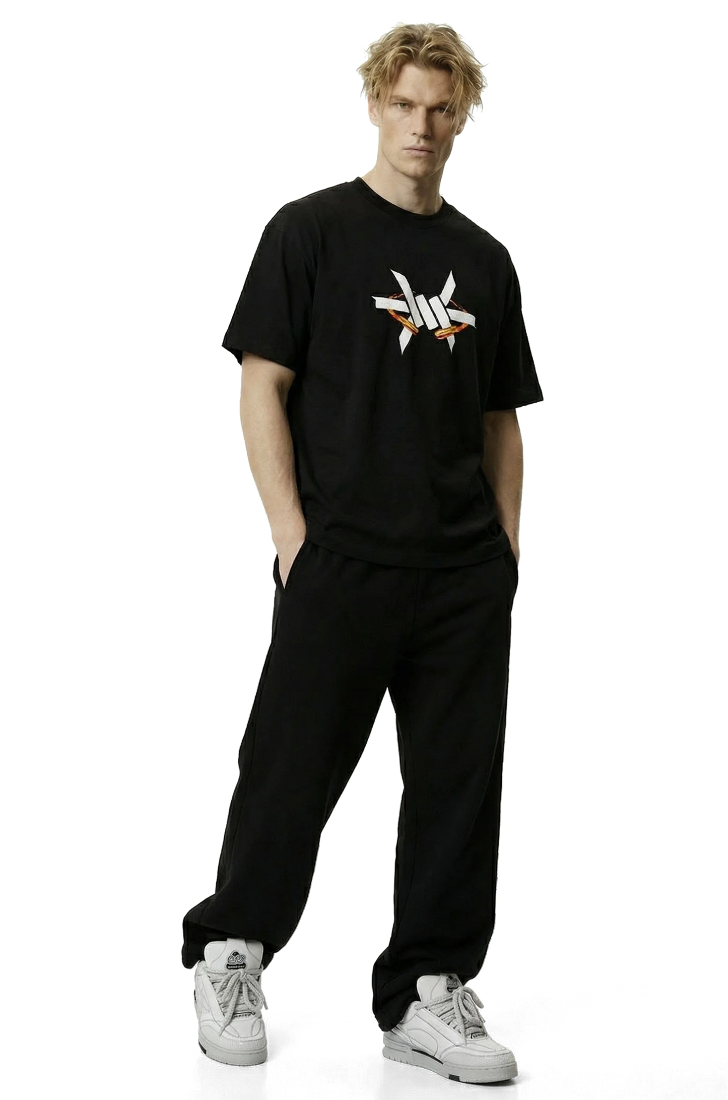 Ominous Fireball Heavyweight Oversized Tee - Person wearing a black t-shirt with a logo and black pants on a white background