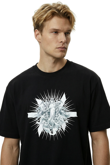 Man wearing a black t-shirt with a white angelic graphic design on a white background