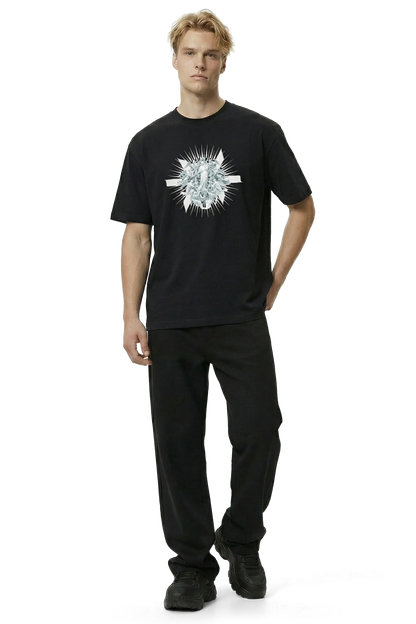 Man wearing a black t-shirt with a white angel Madonna mary catholic graphic design on a white background