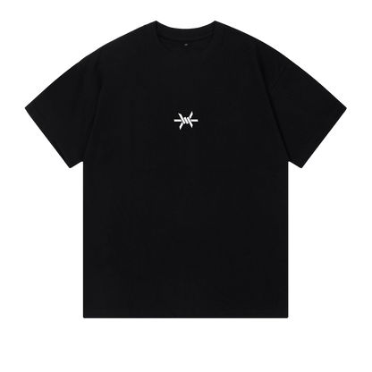 Ominous Ascendance Heavyweight Tee - Front of the black t-shirt showing a small 'Ominous' brand logo positioned in the upper center
