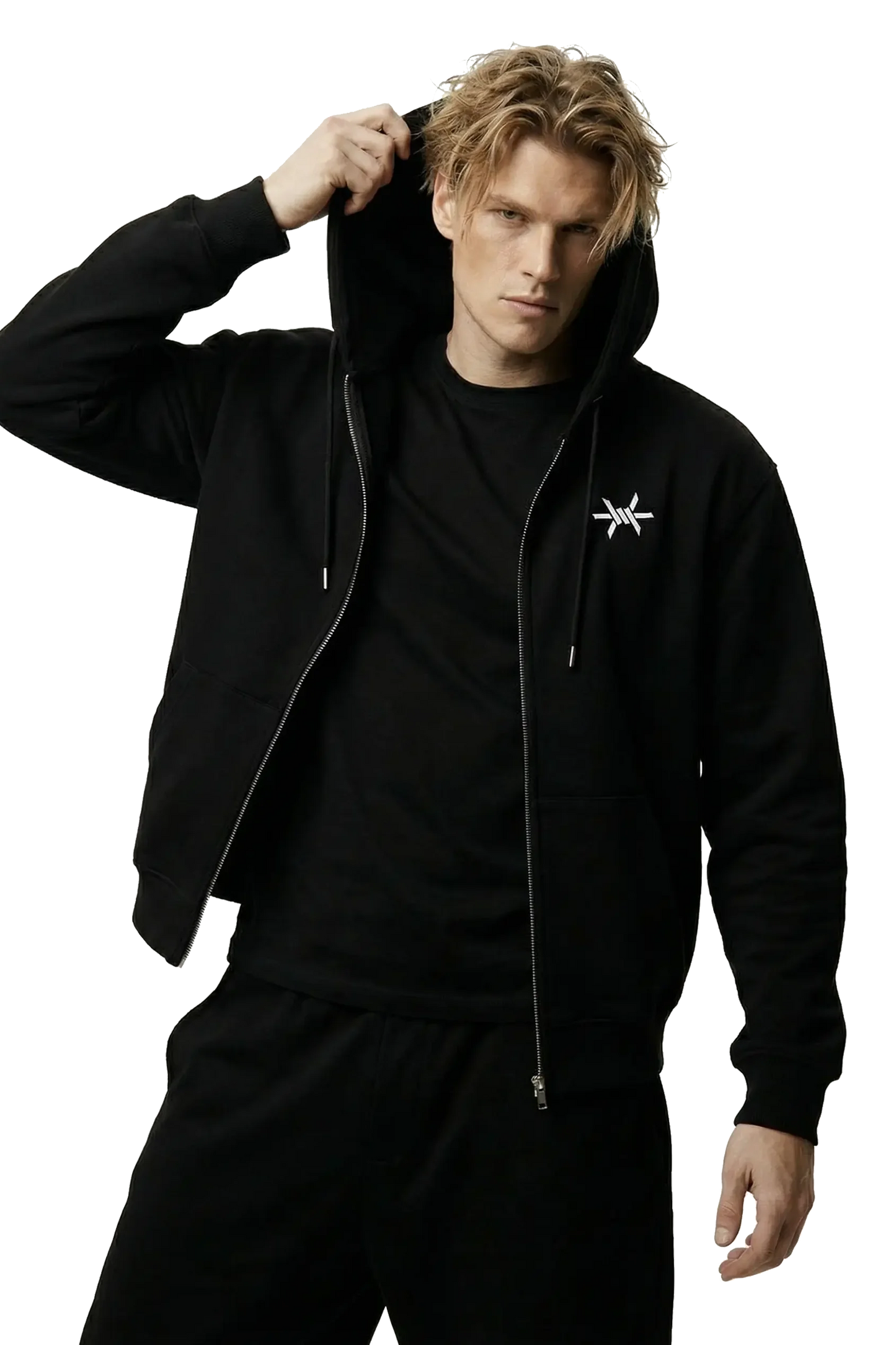 Man wearing a black hoodie with a small 'Ominous' logo on the left chest on a white background