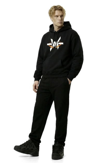 Person wearing a black hoodie with an 'Ominous' brand logo with orange fireballs on a white background