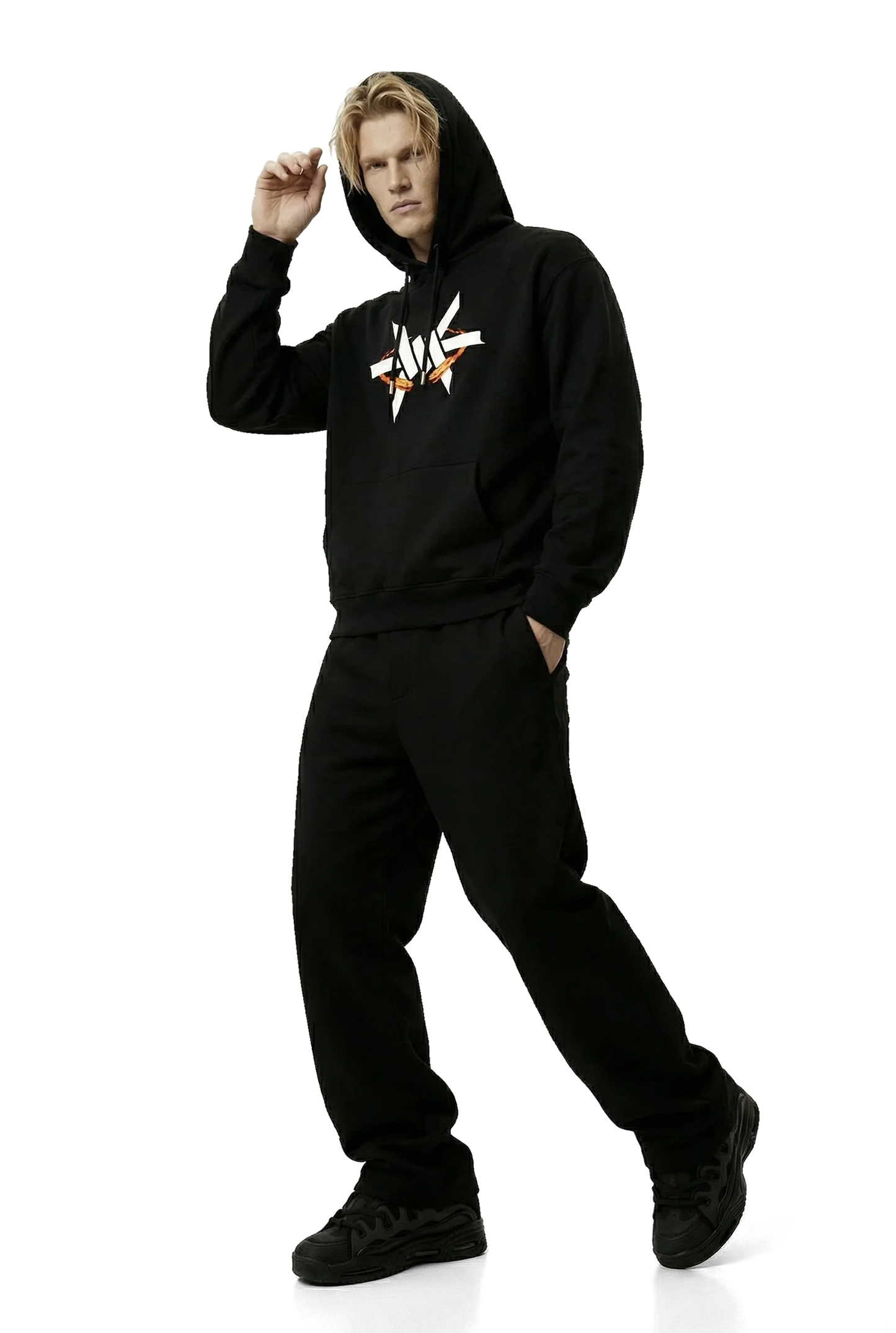 Person wearing a black hoodie with a white logo on a white background