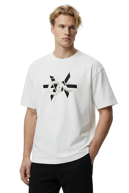 Man wearing a white t-shirt with a white snake coiled around a black 'Ominous' brand logo design on a white background