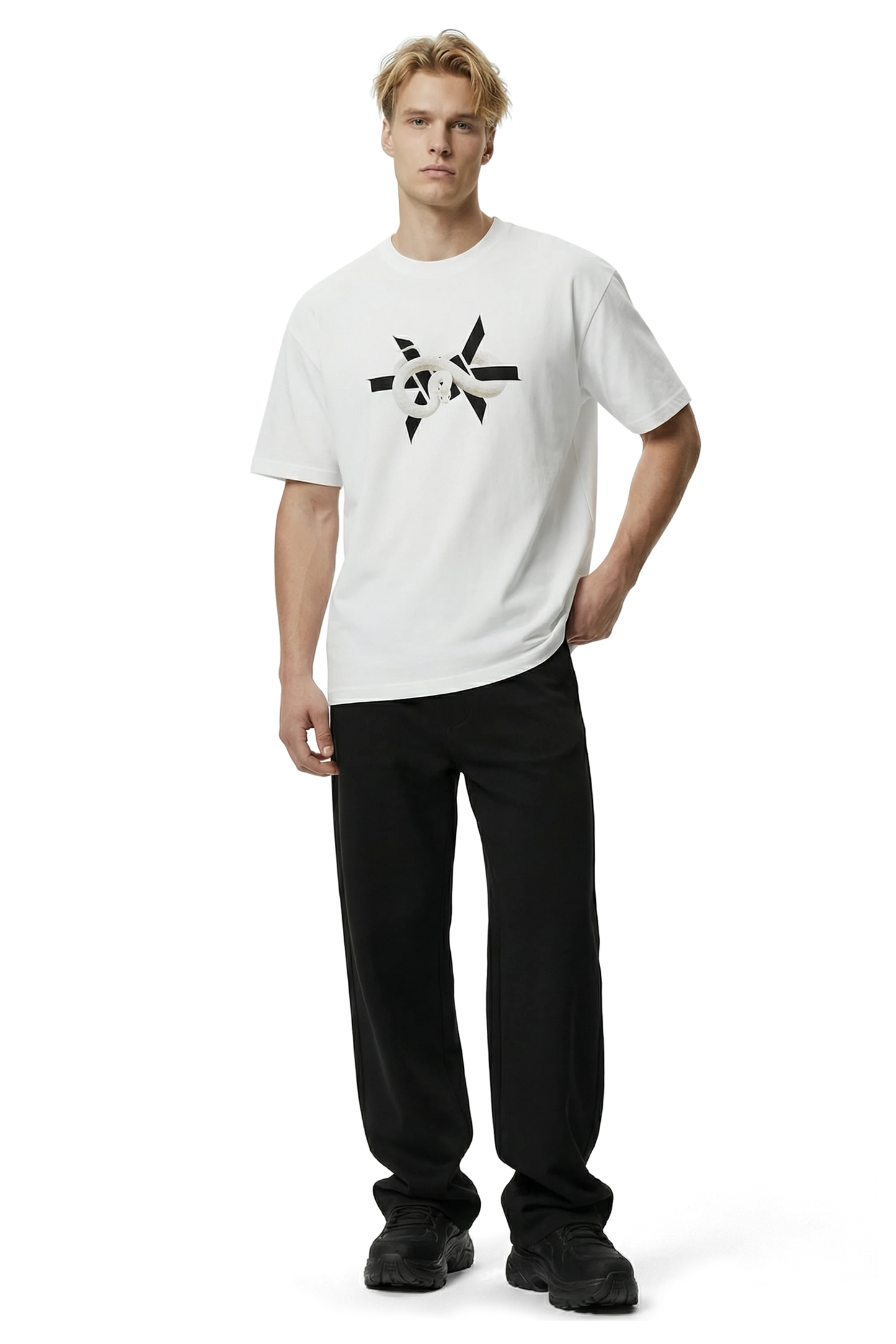 Man wearing a white t-shirt with a black 'Ominous' logo star design and black pants on a white background