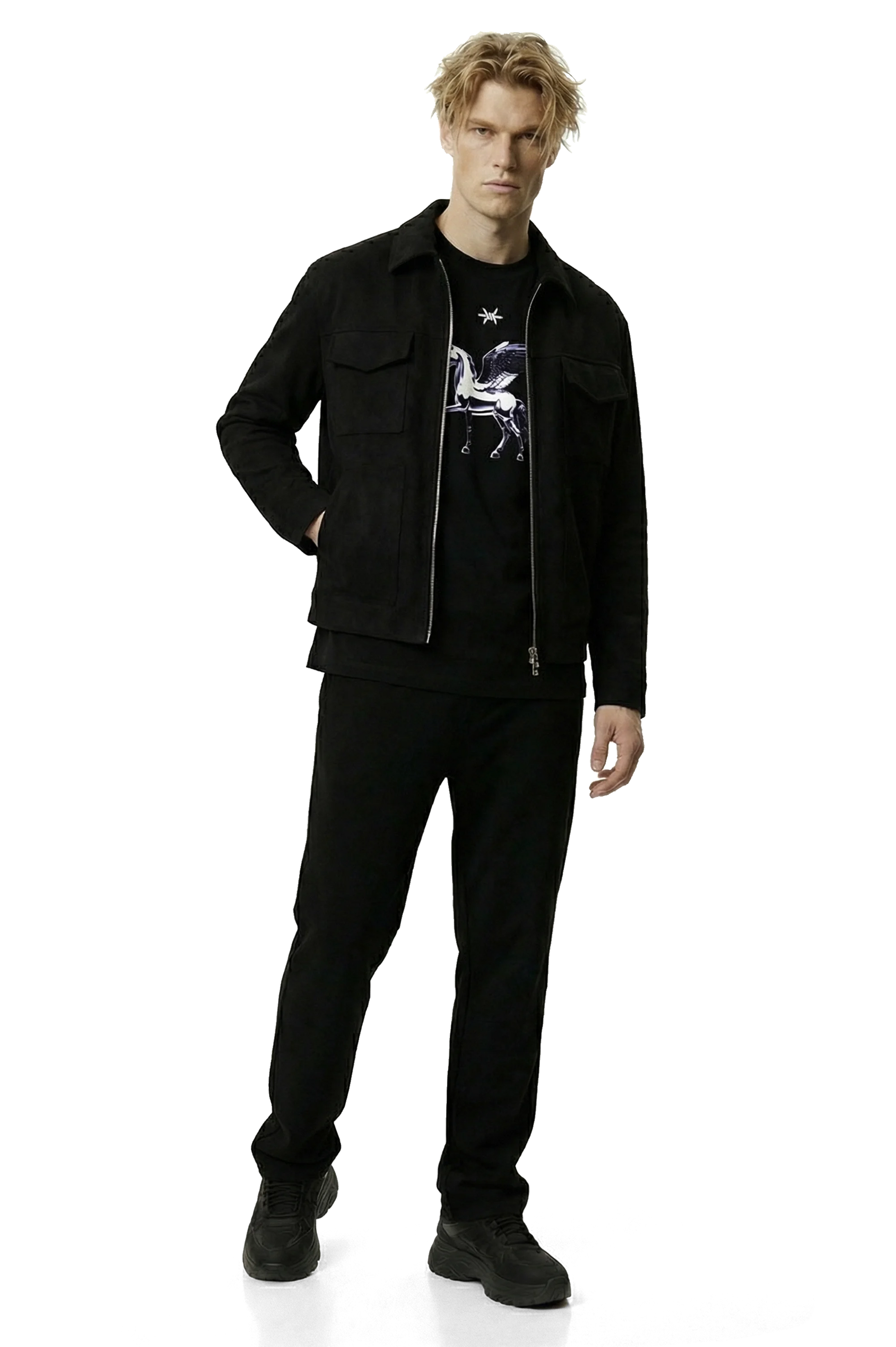 Man wearing a black suede lounge overshirt and pants with a graphic shirt on a white background