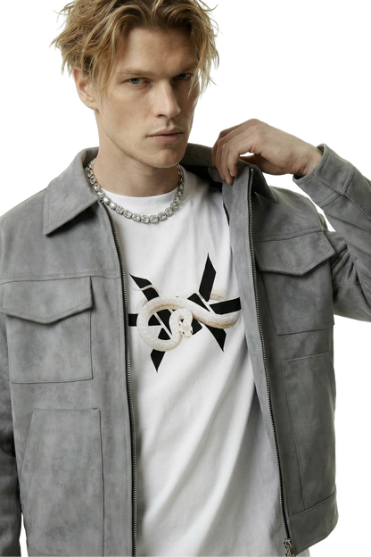 Man wearing a gray suede lounge overshirt jacket over a white t-shirt with a black and white snake 'Ominous' brand logo design, on a white background