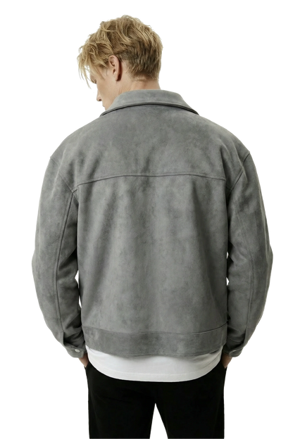 Man wearing a gray suede lounge overshirt jacket on a white background